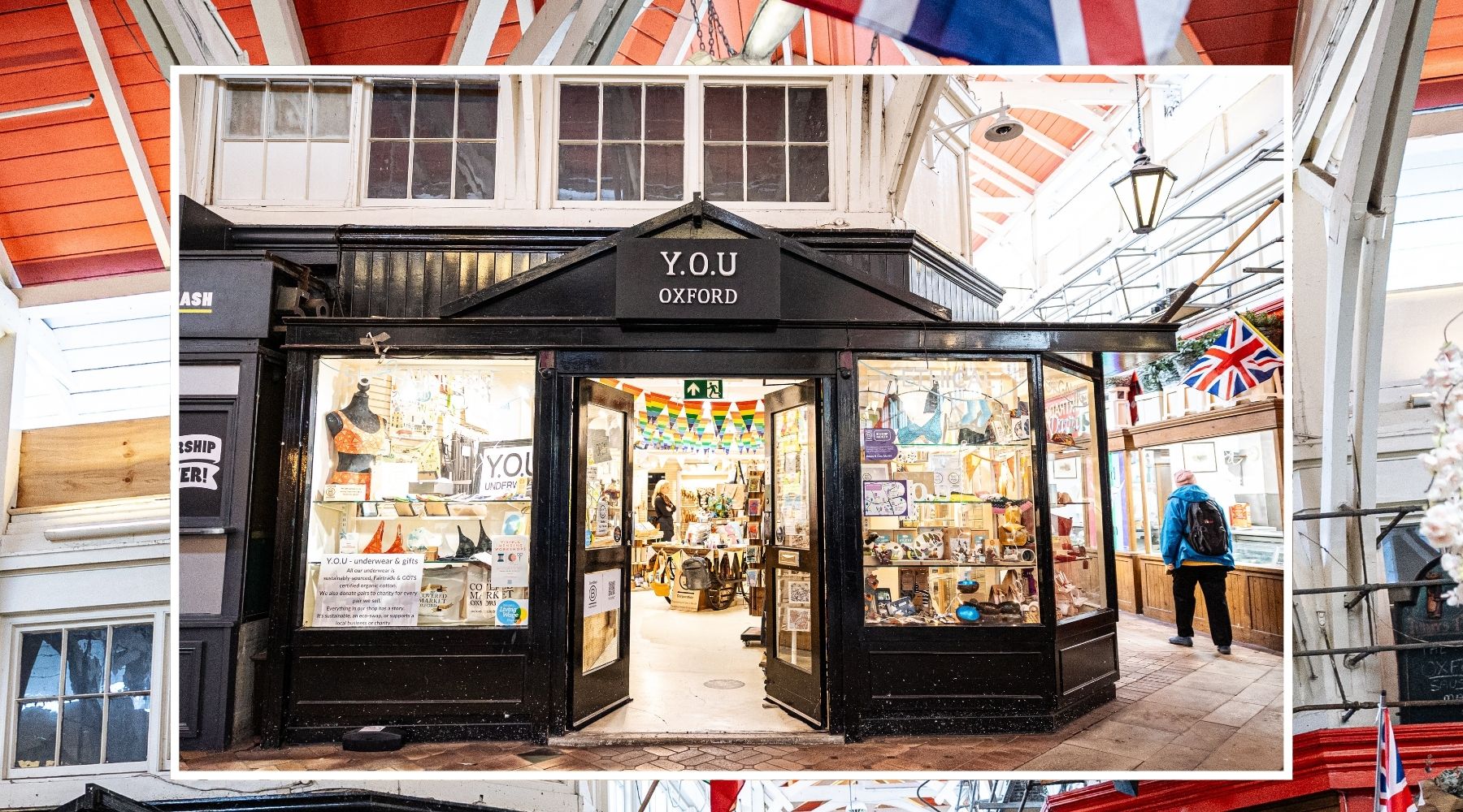 Photo of the exterior of the Y.O.U Oxford shop with brightly lit windows full of colourful product displays.
