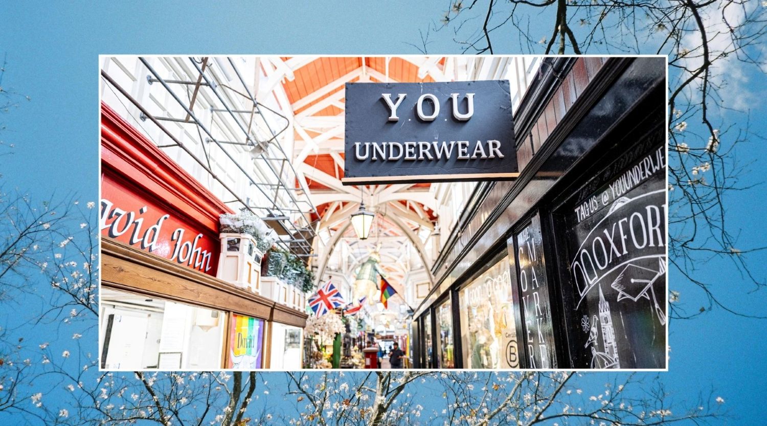Blog Banner: Photo of the outside of Y.O.U Oxford, with a border showing blue sky and blossom