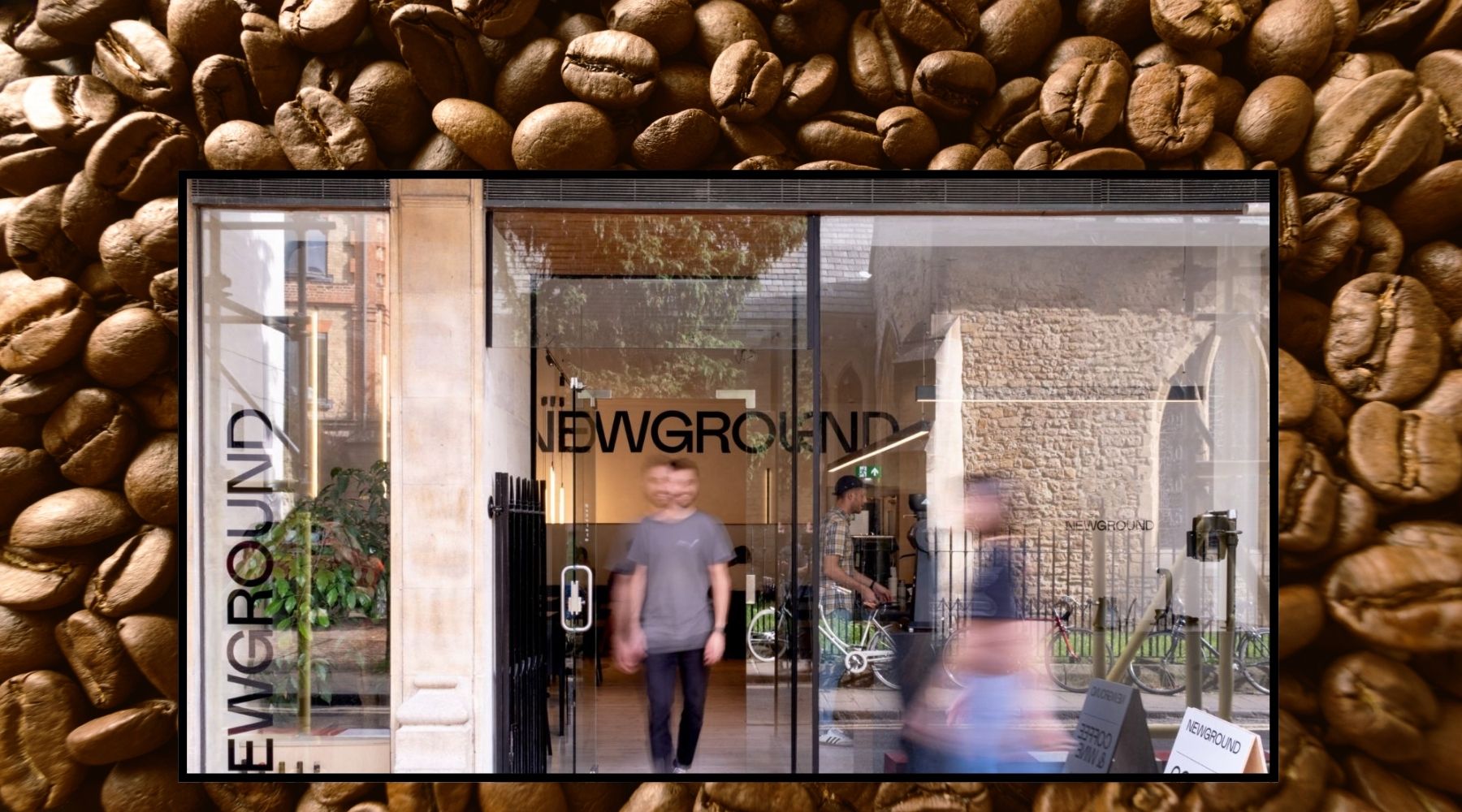 Image of the exterior of New Ground Coffee in Oxford on a backdrop of coffee beans