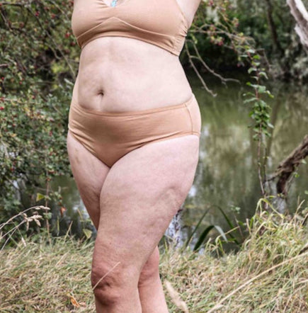 model wearing organic cotton mid rise bikini almond - You Underwear