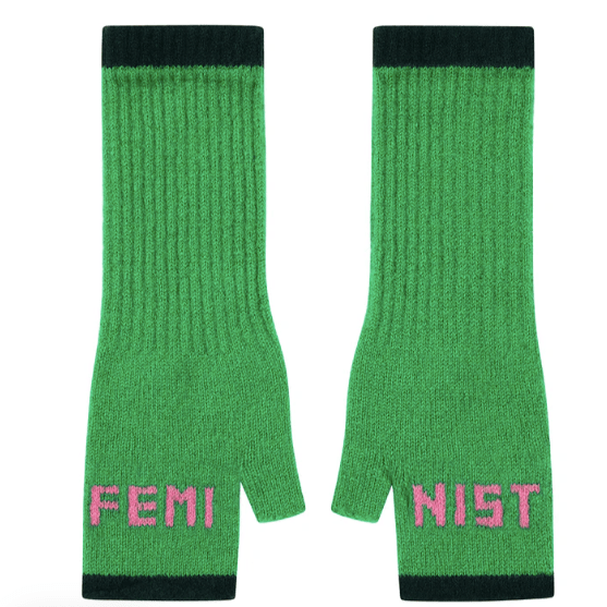 A flat lay photo of the Black & Beech Feminist Gloves in bottle green with light pink writing and dark green cuffs.