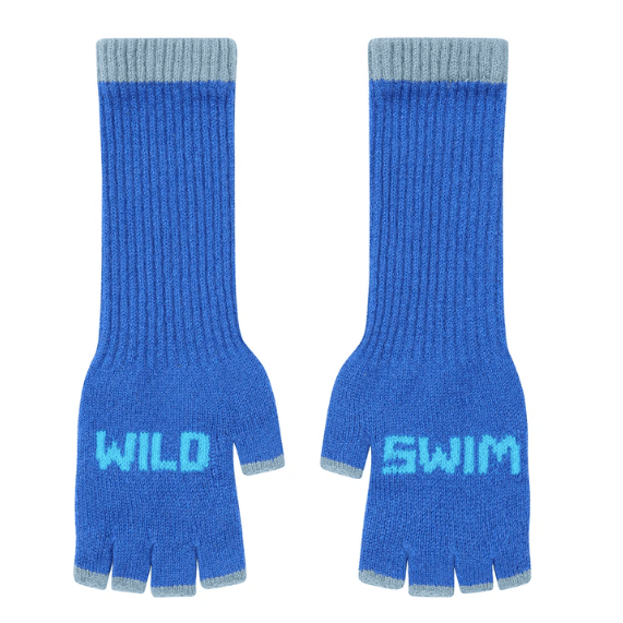 A flat lay photo of the Black & Beech Wild Swim gloves in bright blue with baby blue writing and cuffs on a white background.