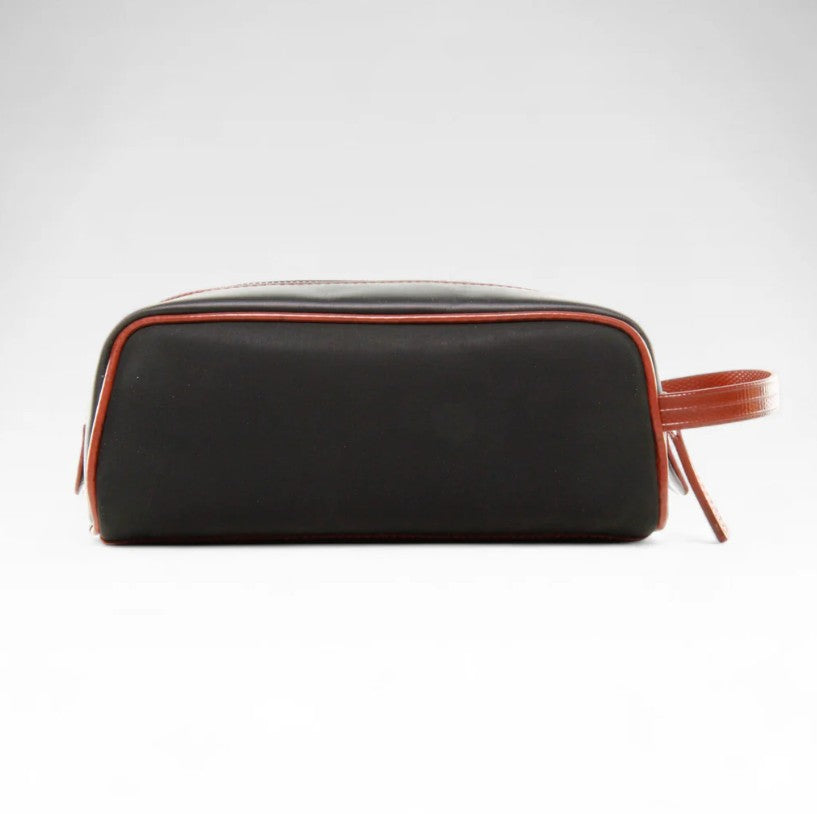 The Elvis and Kresse red printing blanket travel case on a white bakcground
