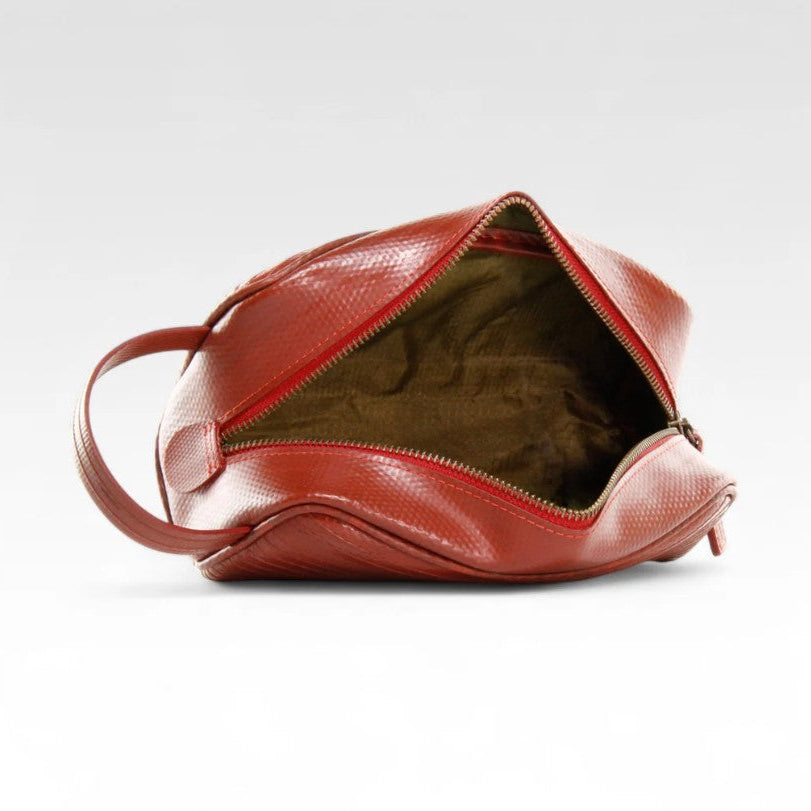 The Elvis and Kresse Red Travel Case open on a white background