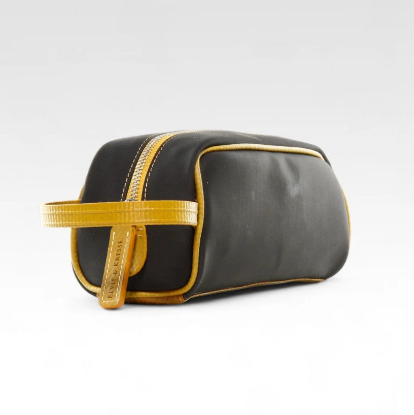 The Elvis and Kresse yellow printing blanket travel case on a white background