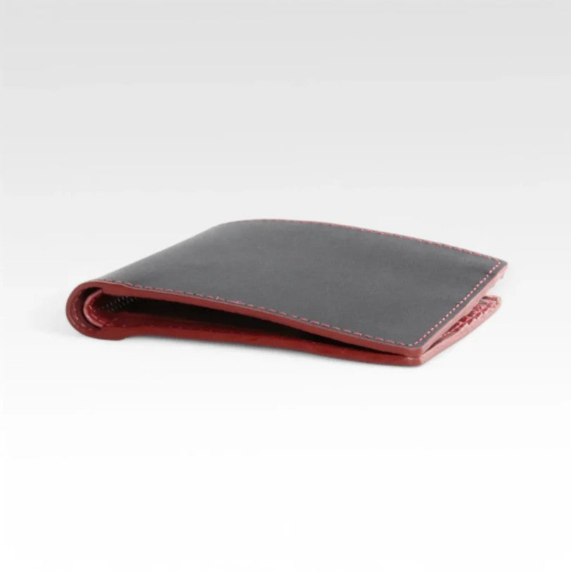 The Elvis and Kresse red and black printing blanket wall billfold wallet in front of a white background