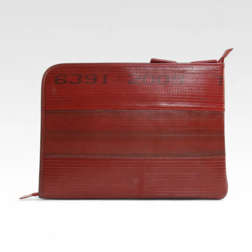 The Elvis and Kresse red laptop case on a white background, front view