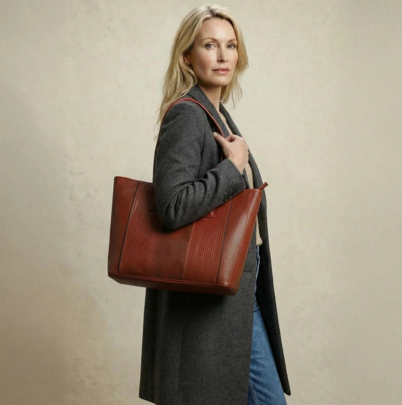 Red Elvis and Kresse Tote Bag on the shoulder of a female model