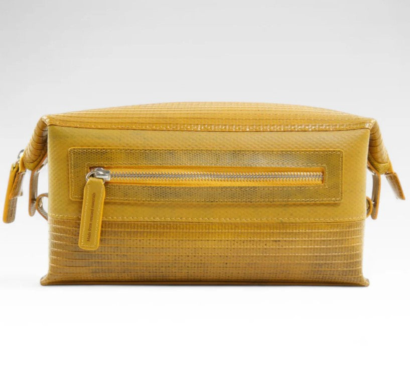 Elvis and Kresse yellow large wash bag on a white background
