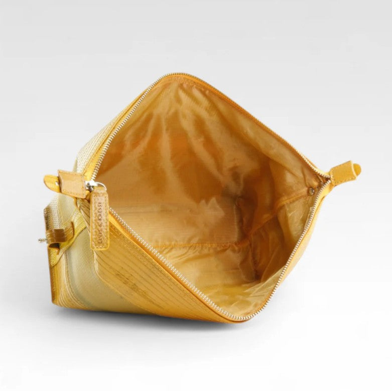 Elvis and Kresse yellow large wash bag open on a white background