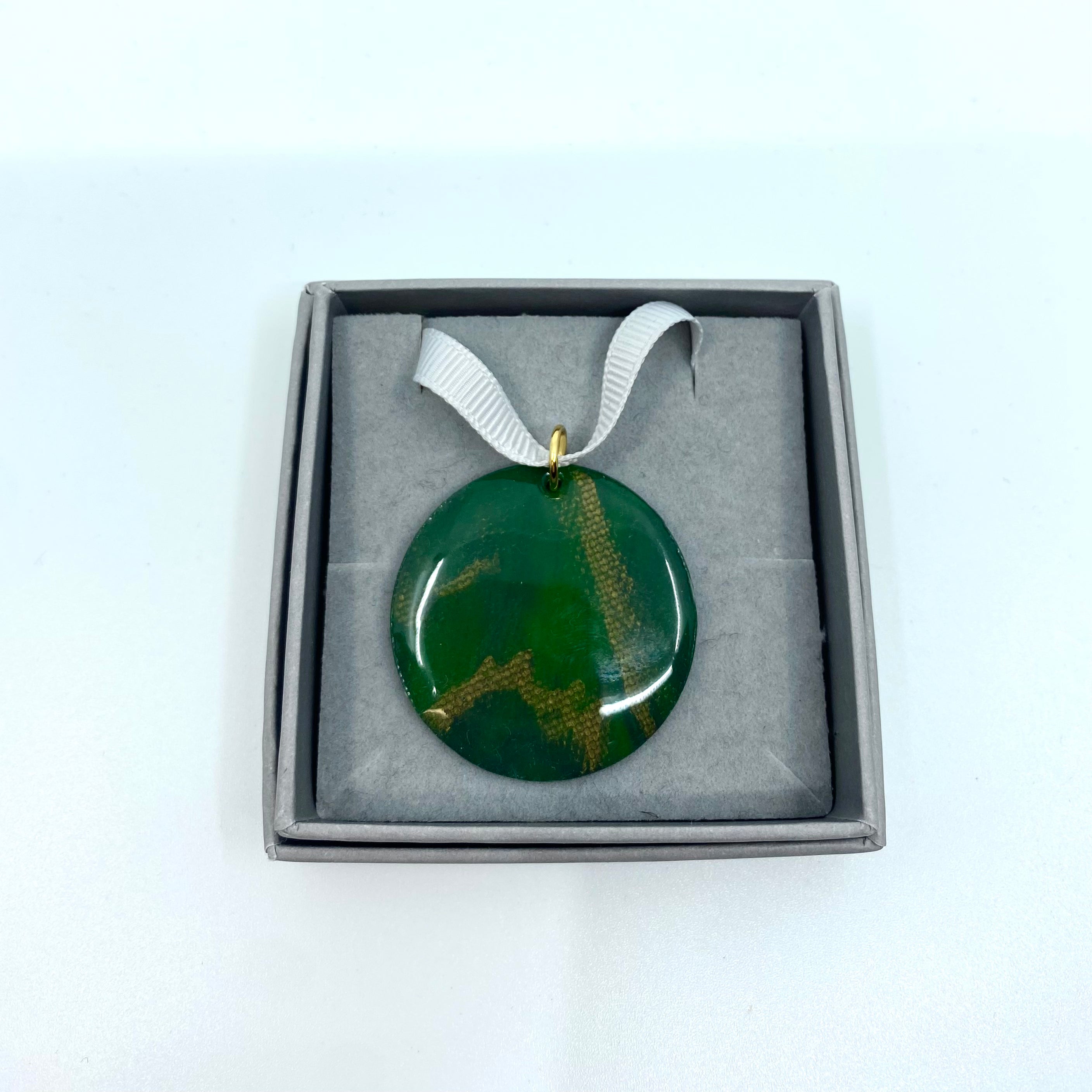 Statement pendant - recycled Y.O.U mailing bag