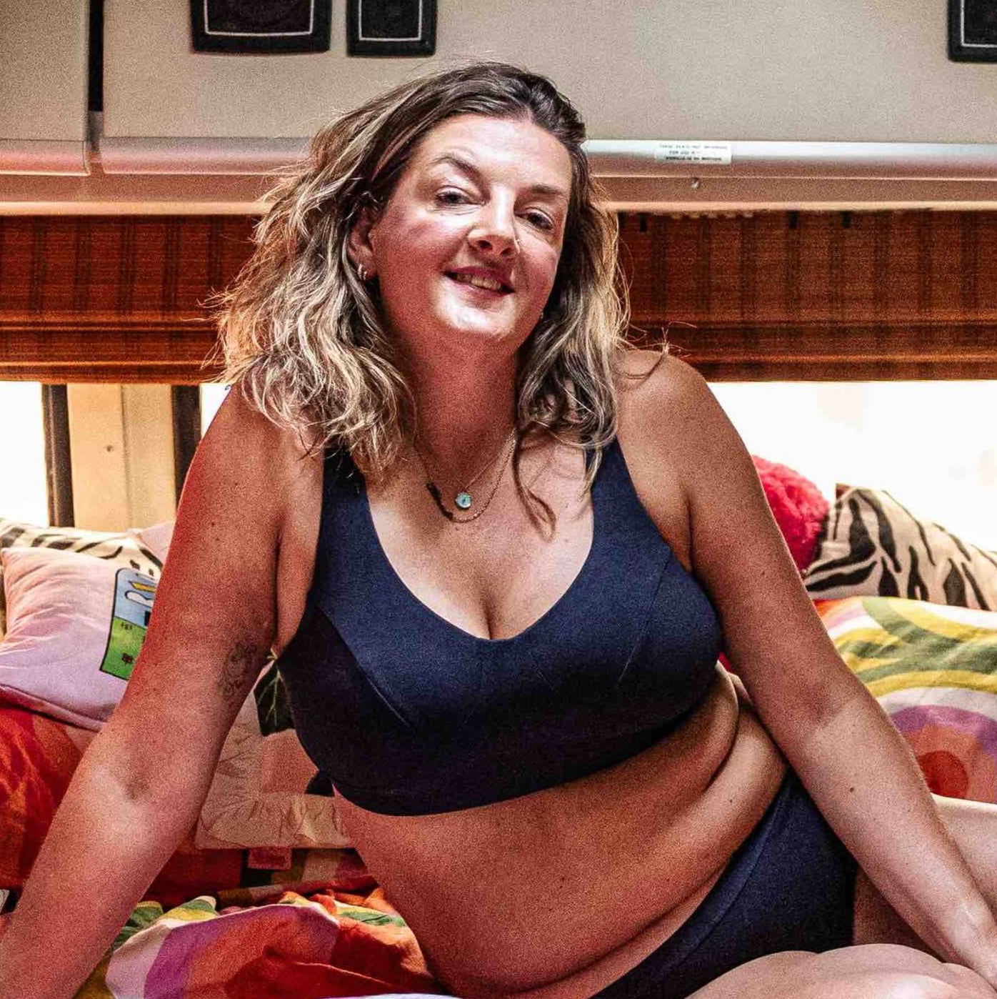 model wearing organic cotton more supportive bra navy - You Underwear