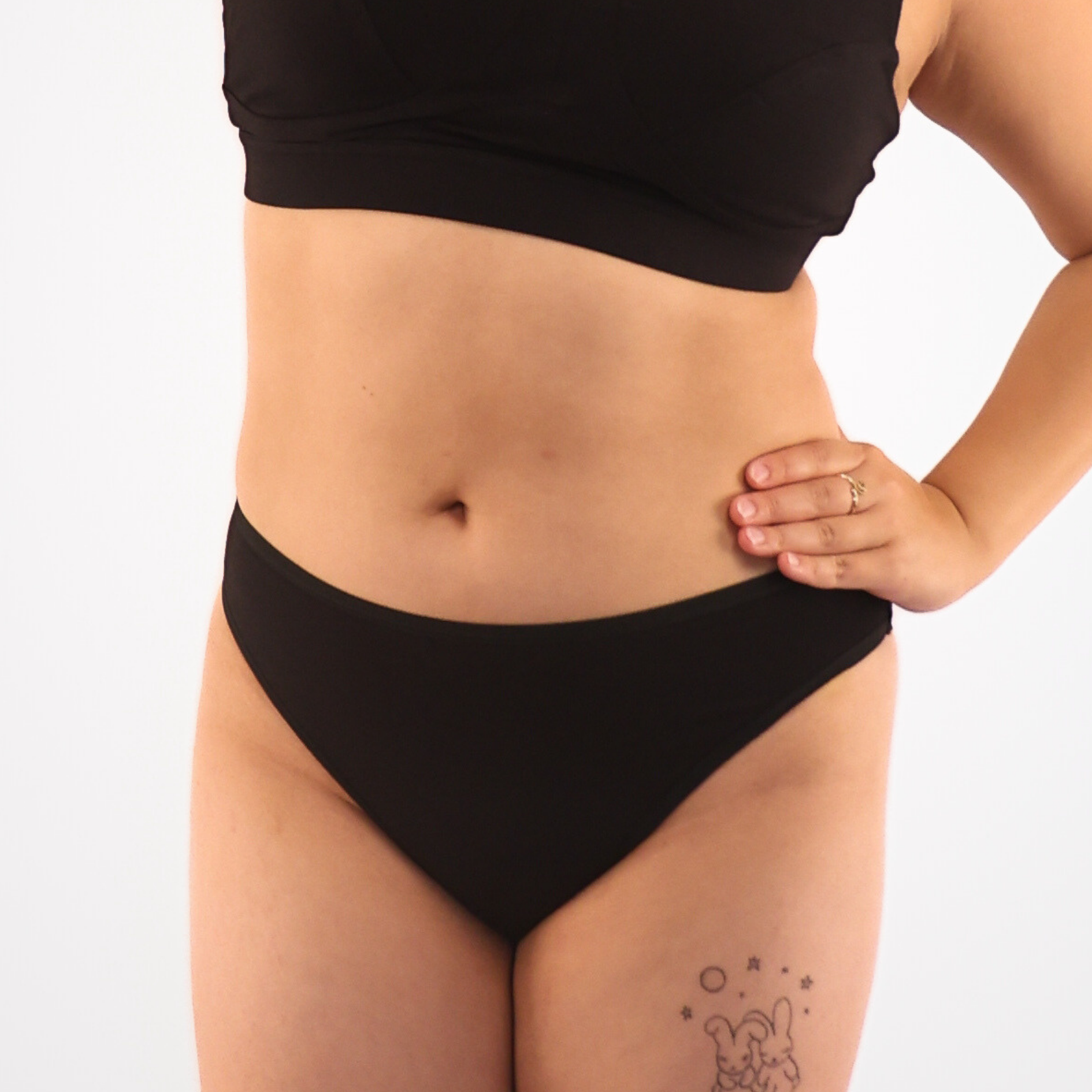 Women's organic cotton mid-rise bikini bottoms in black