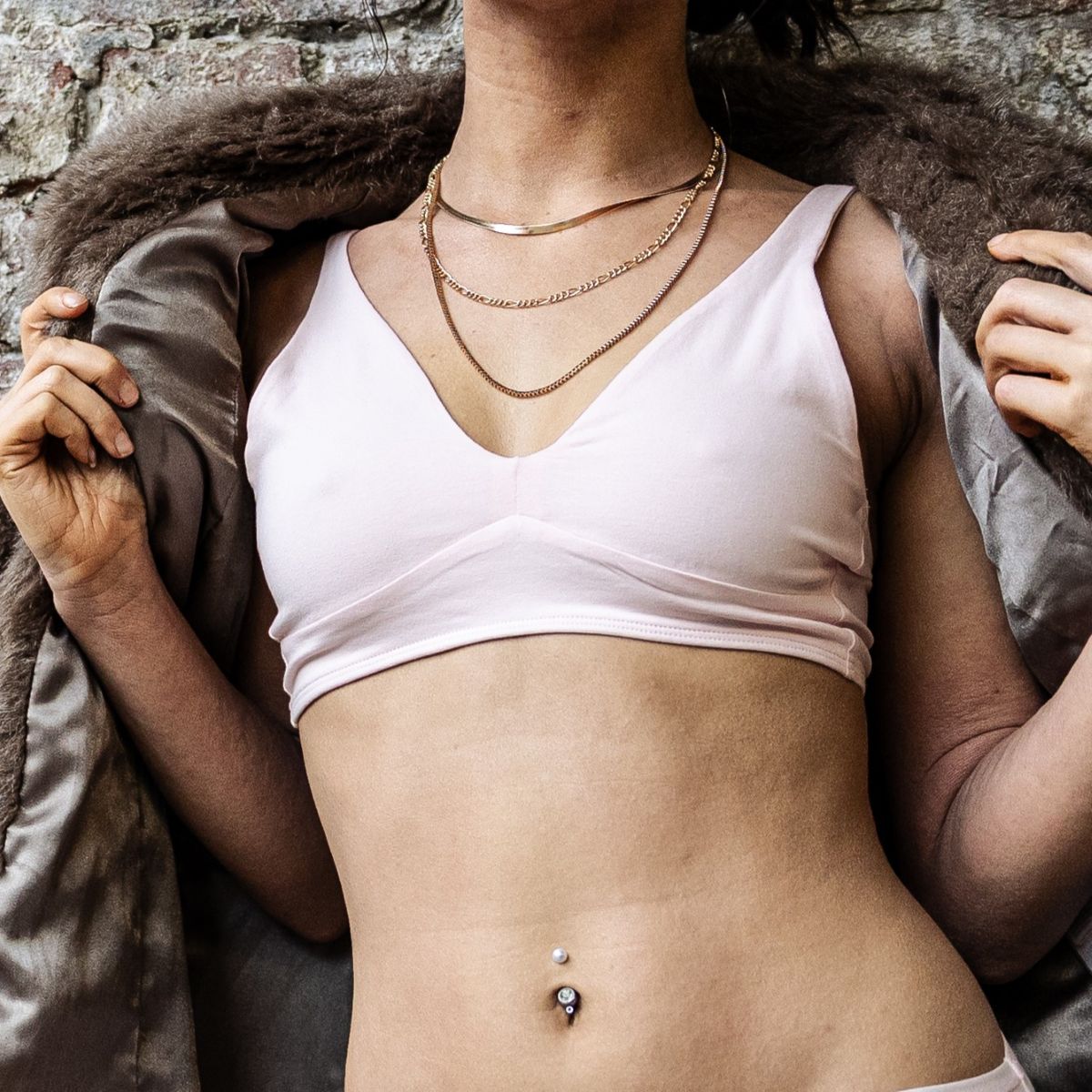 Model wearing an organic cotton light pink bralette - You Underwear