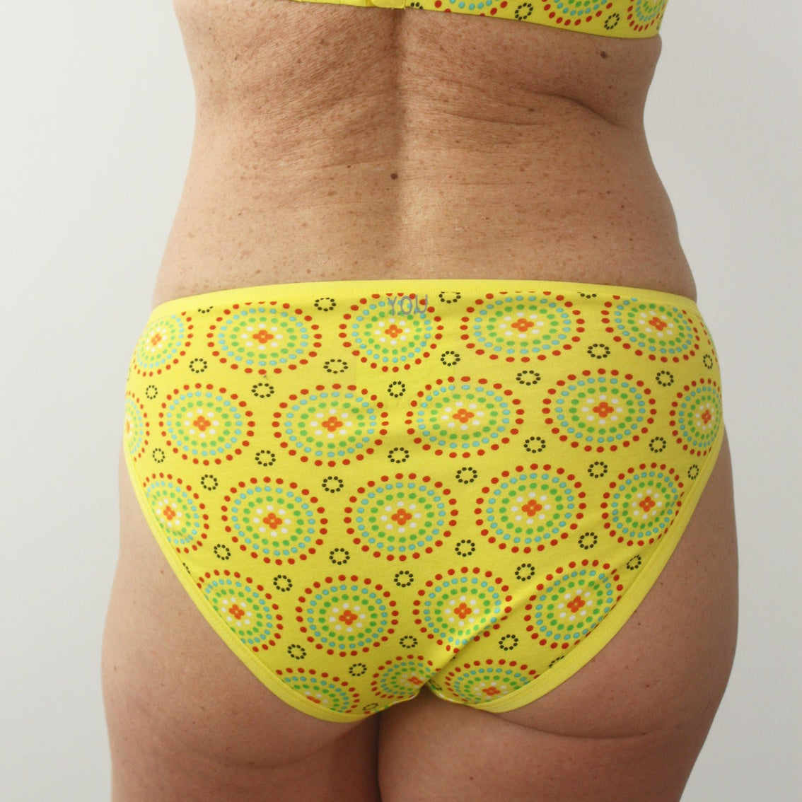model wearing organic cotton mid rise bikini knickers in yellow mara-You Underwear