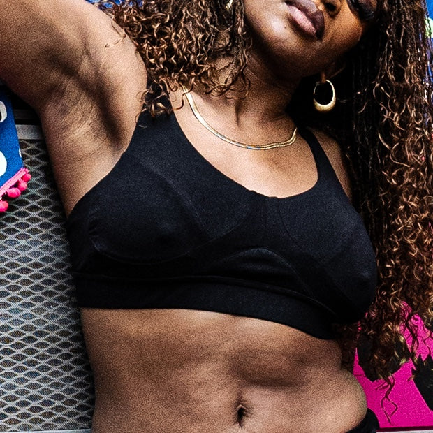 model wearing organic cotton non wired bra black - You Underwear