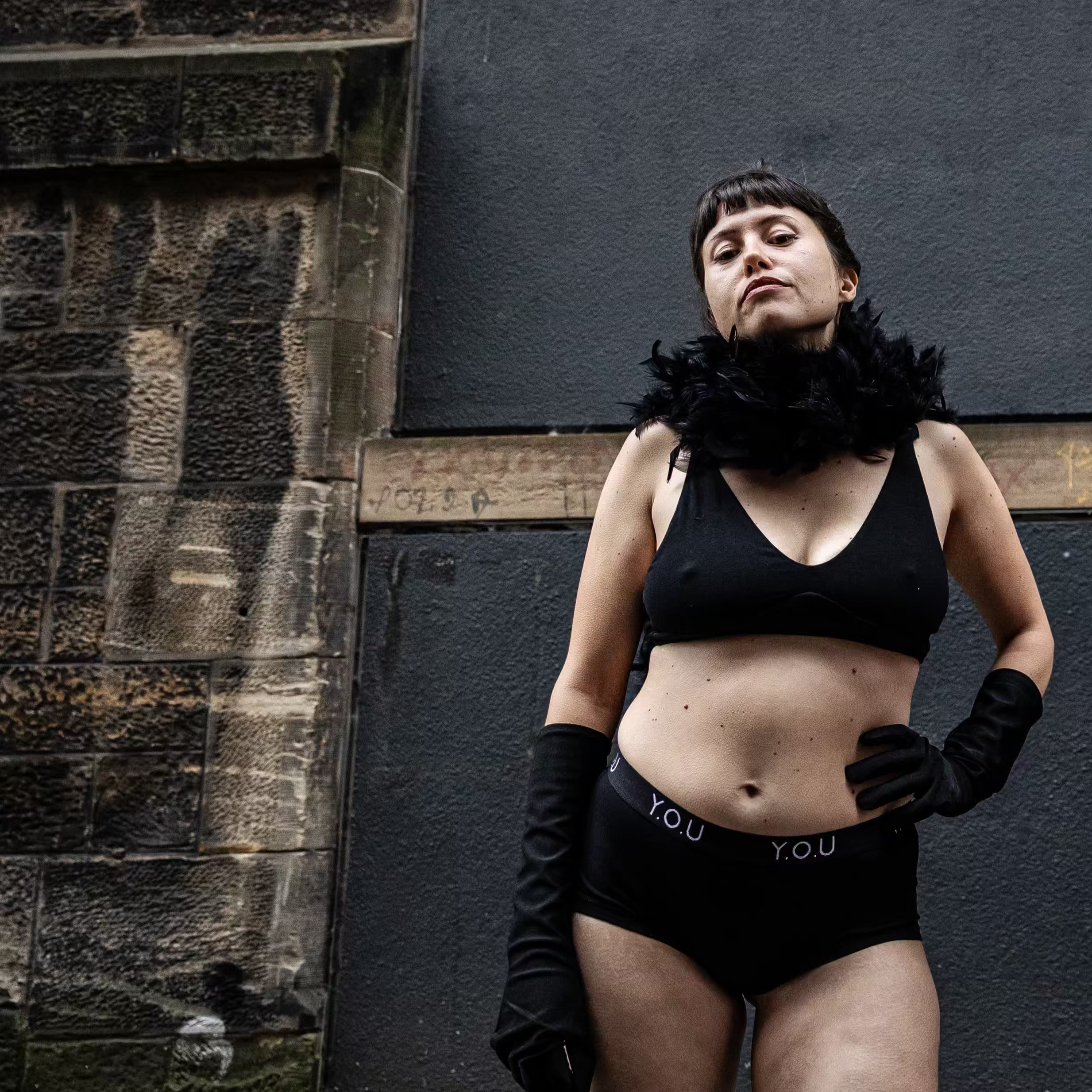 model wearing organic cotton matching set with a black bralette and YOU branded boy shorts - You Underwear