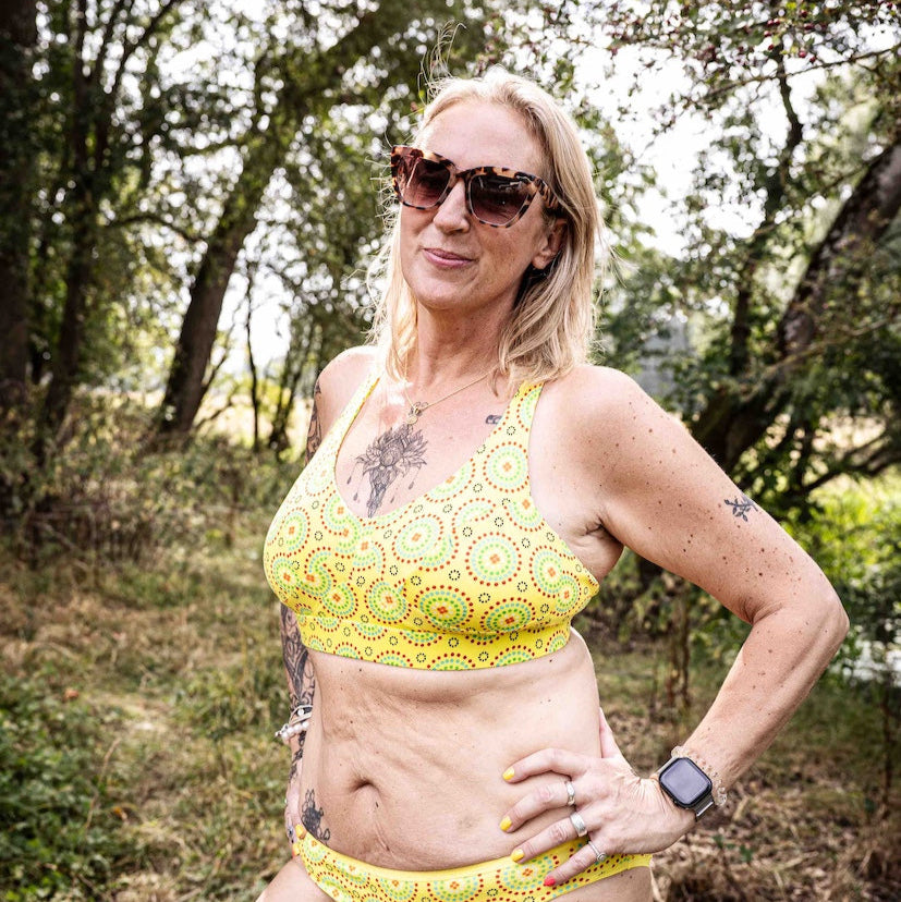 model wearing organic cotton more supportive bra yellow mara print - You Underwear
