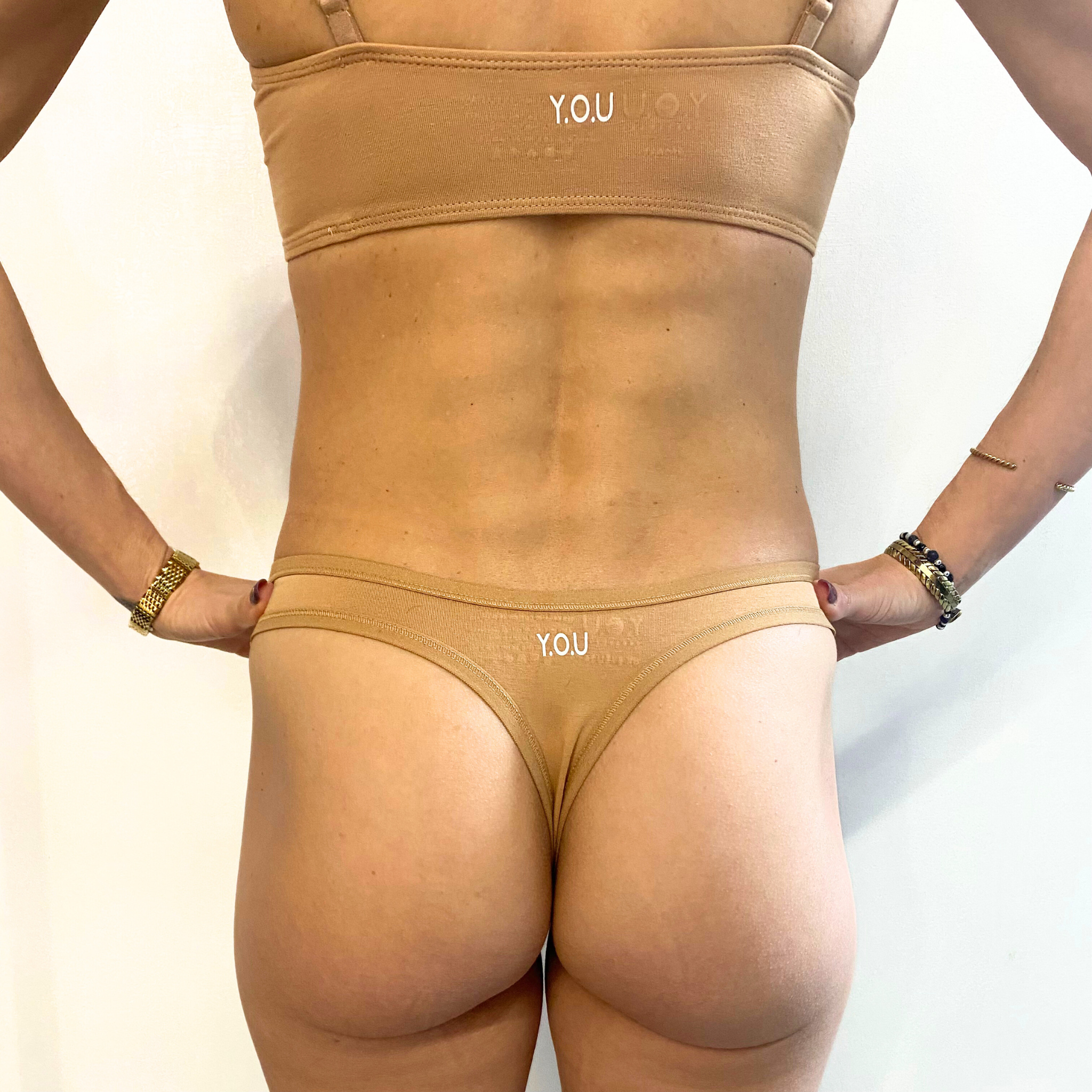 Women's organic cotton thong in almond (light nude)