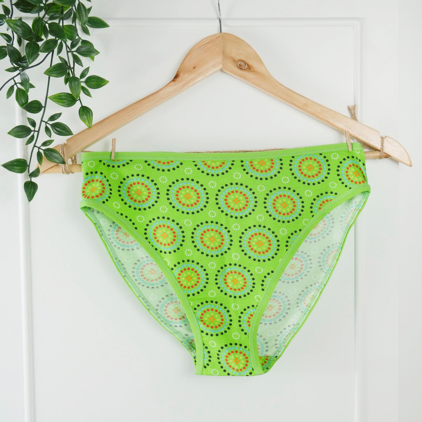 Women's organic cotton matching bralette and mid-rise bikini set - Green Mara design