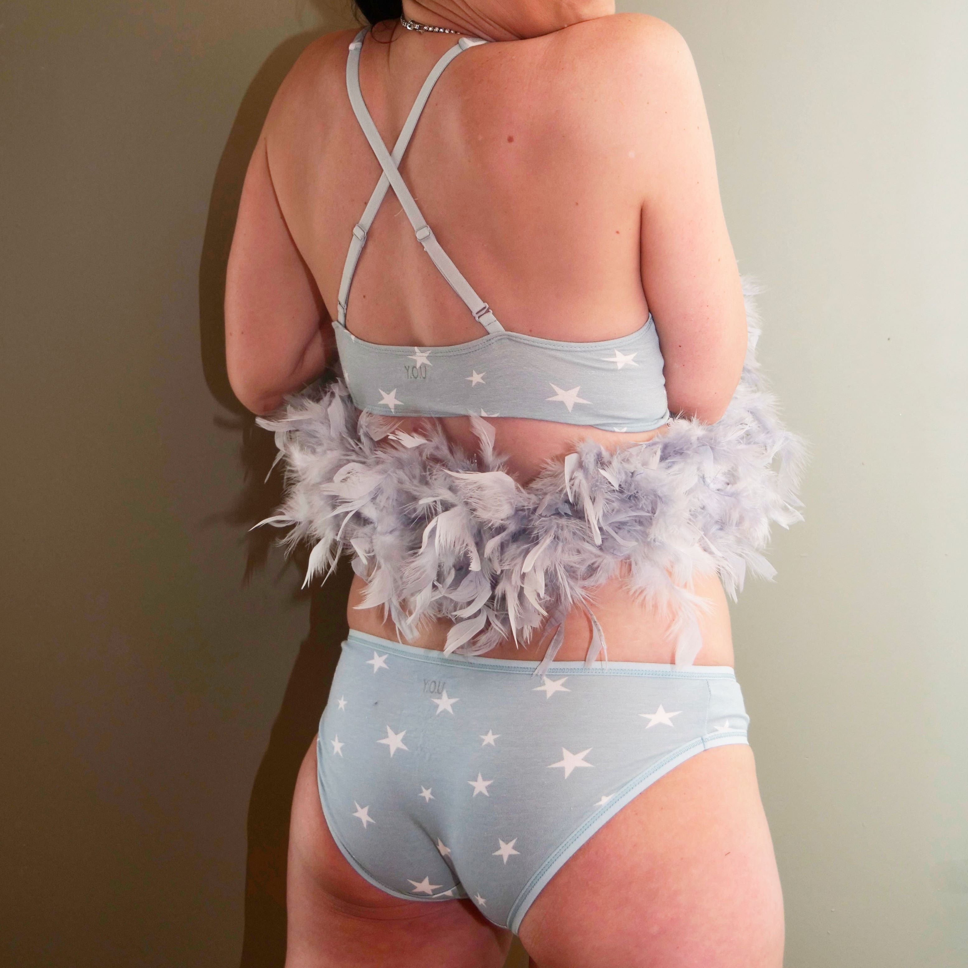 Women's organic cotton matching bralette and low-rise bikini set - blue with white stars pattern