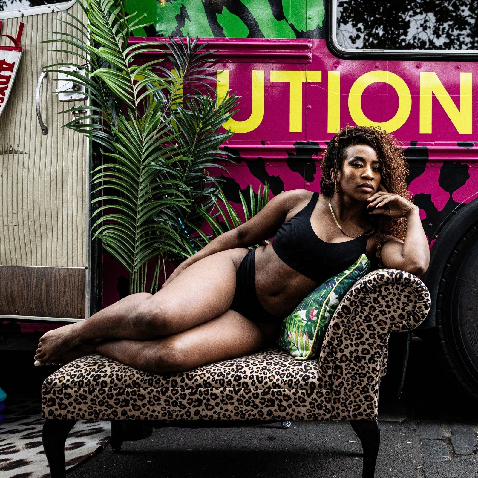 Model wearing an organic cotton non-wired bra and thong set in black - Y.O.U Underwear