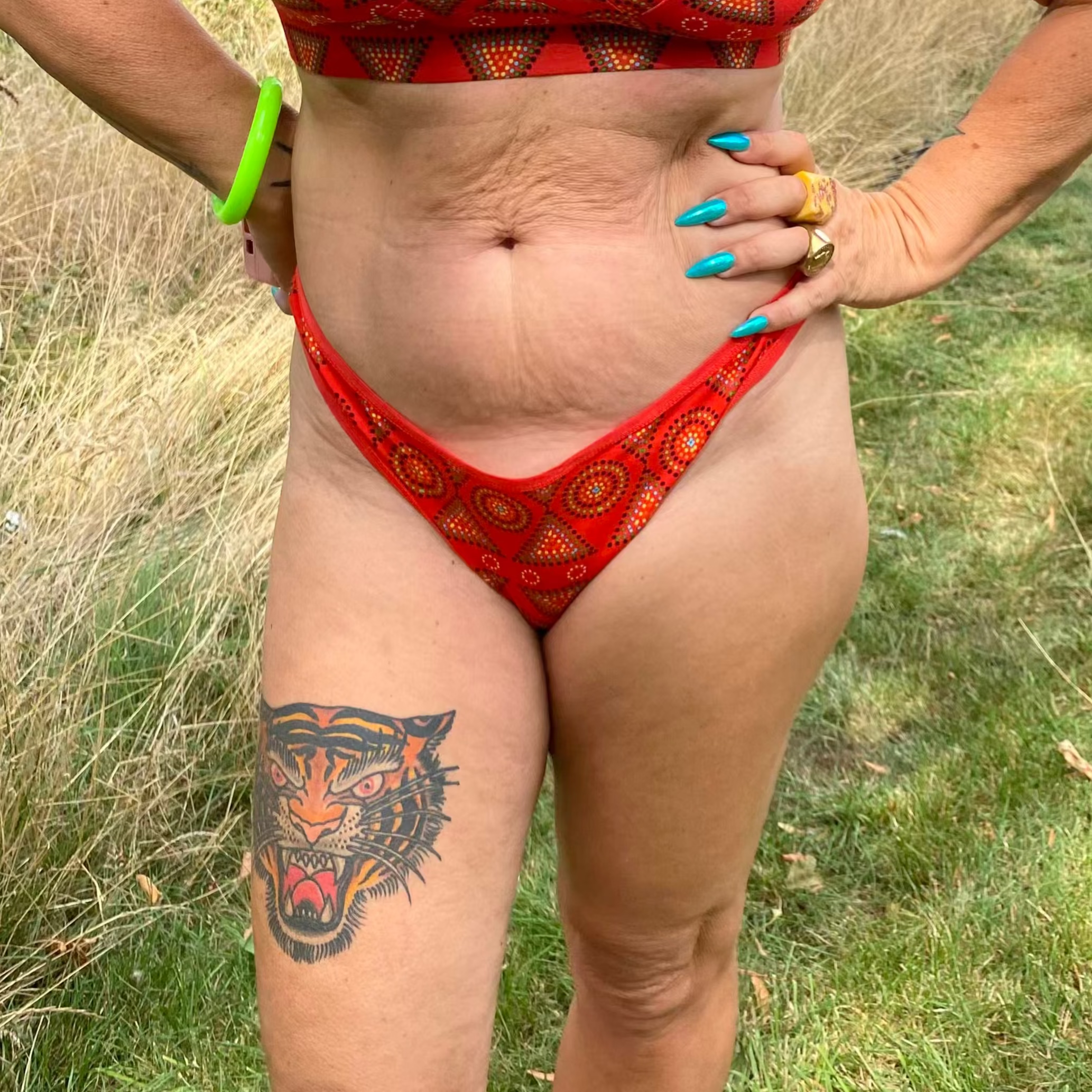 model wearing organic cotton thong red mara - You Underwear