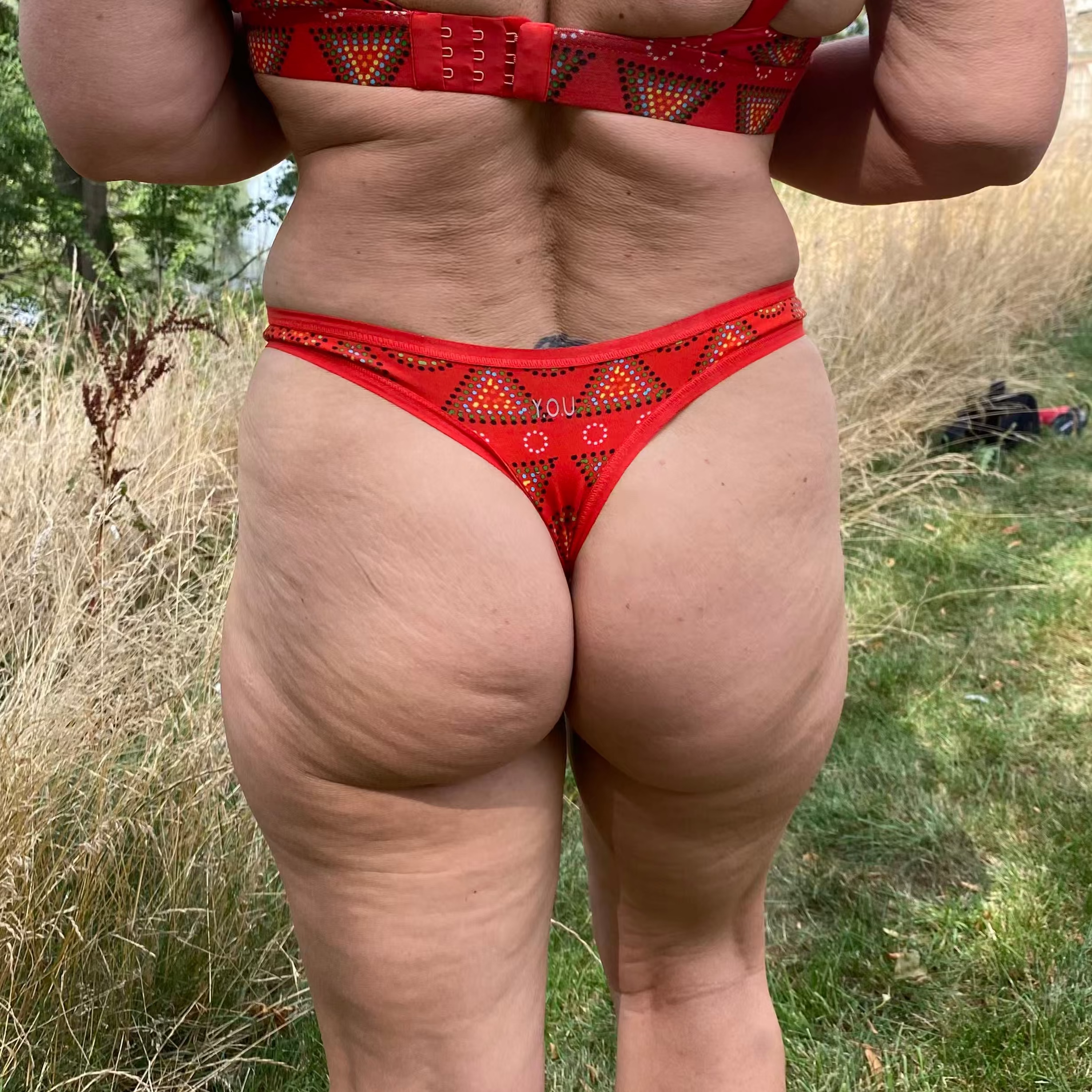 model wearing organic cotton thong red mara - You Underwear