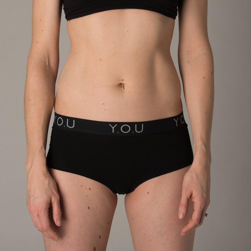Women's black boy shorts with Y.O.U elastic waistband - front view