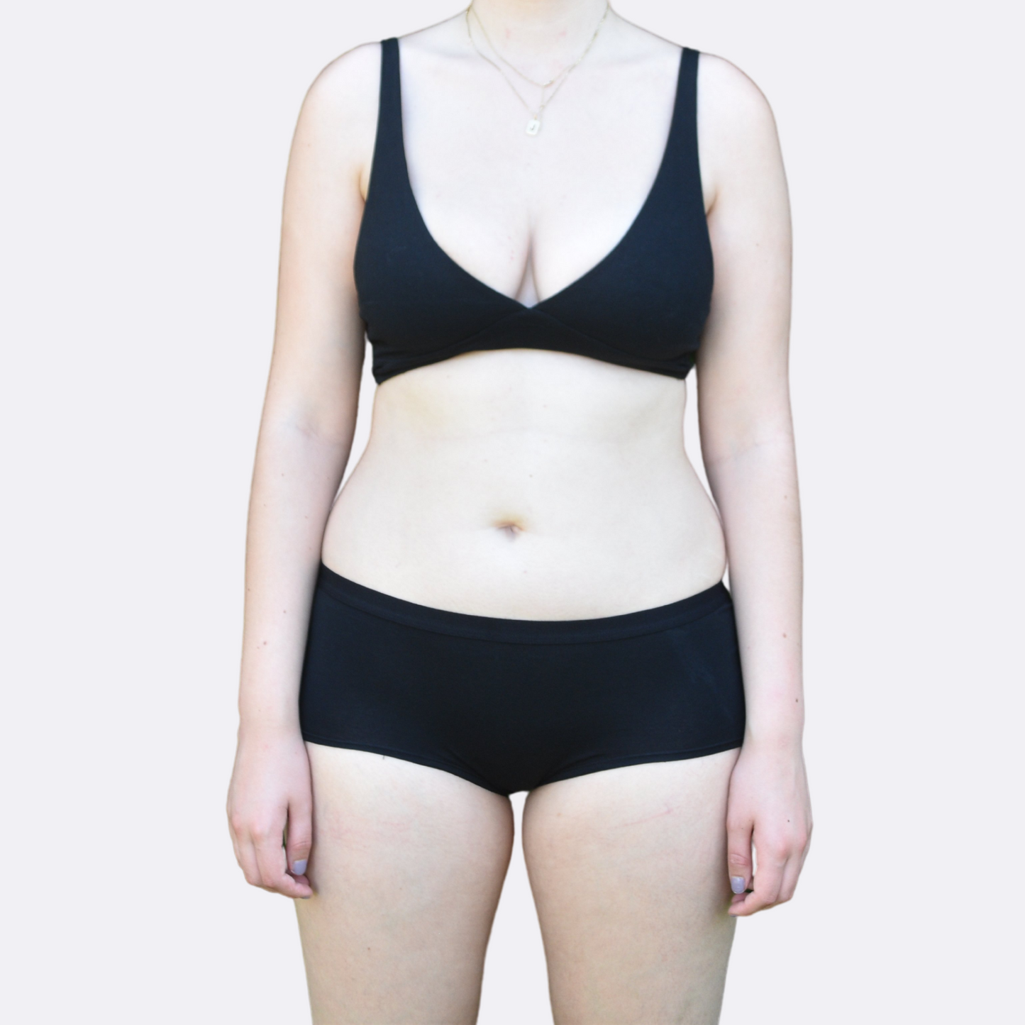 Women's black bralette and plain boy shorts - front view