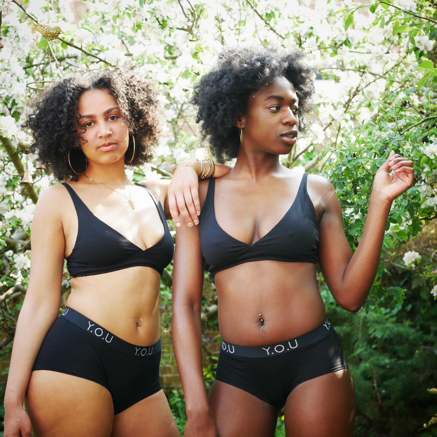 Women's Y.O.U boy shorts and bralette sets - model shot in the garden