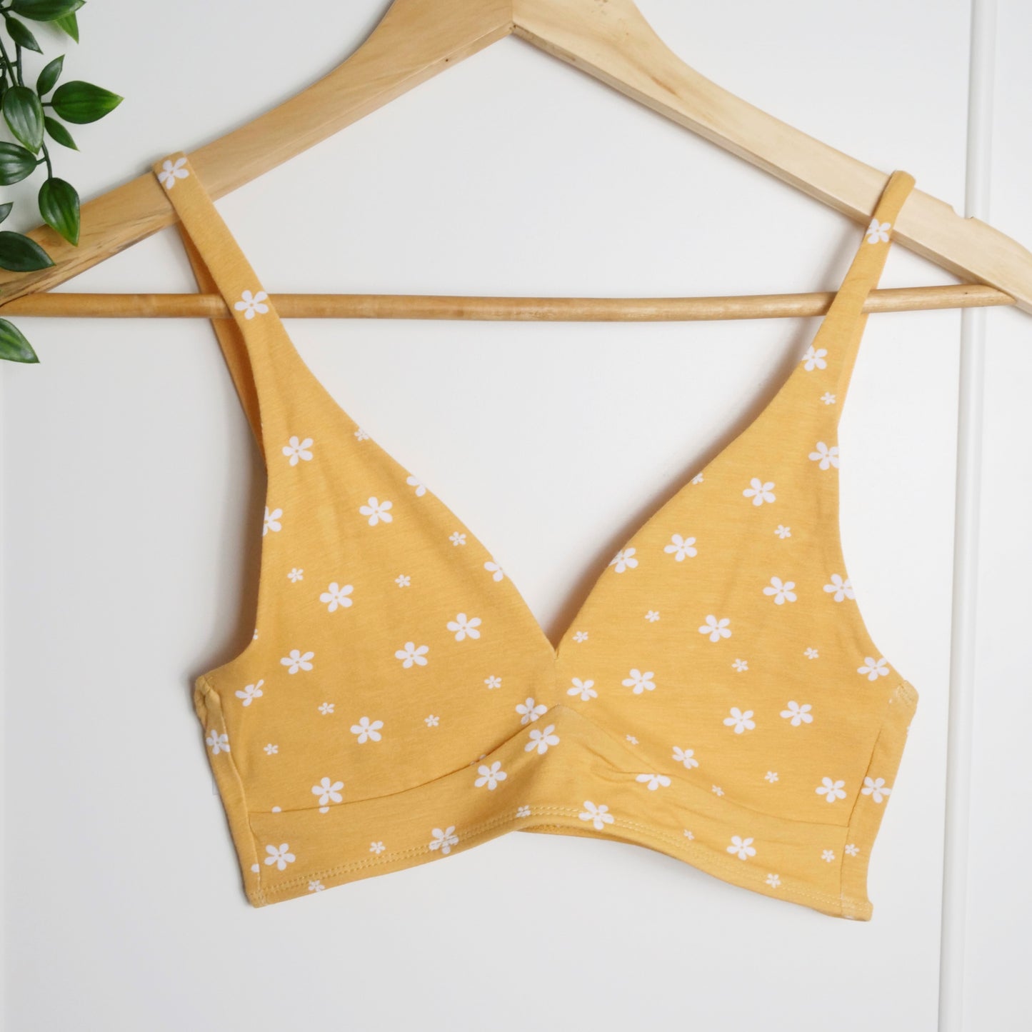 Women's organic cotton bralette in a yellow with white flowers pattern