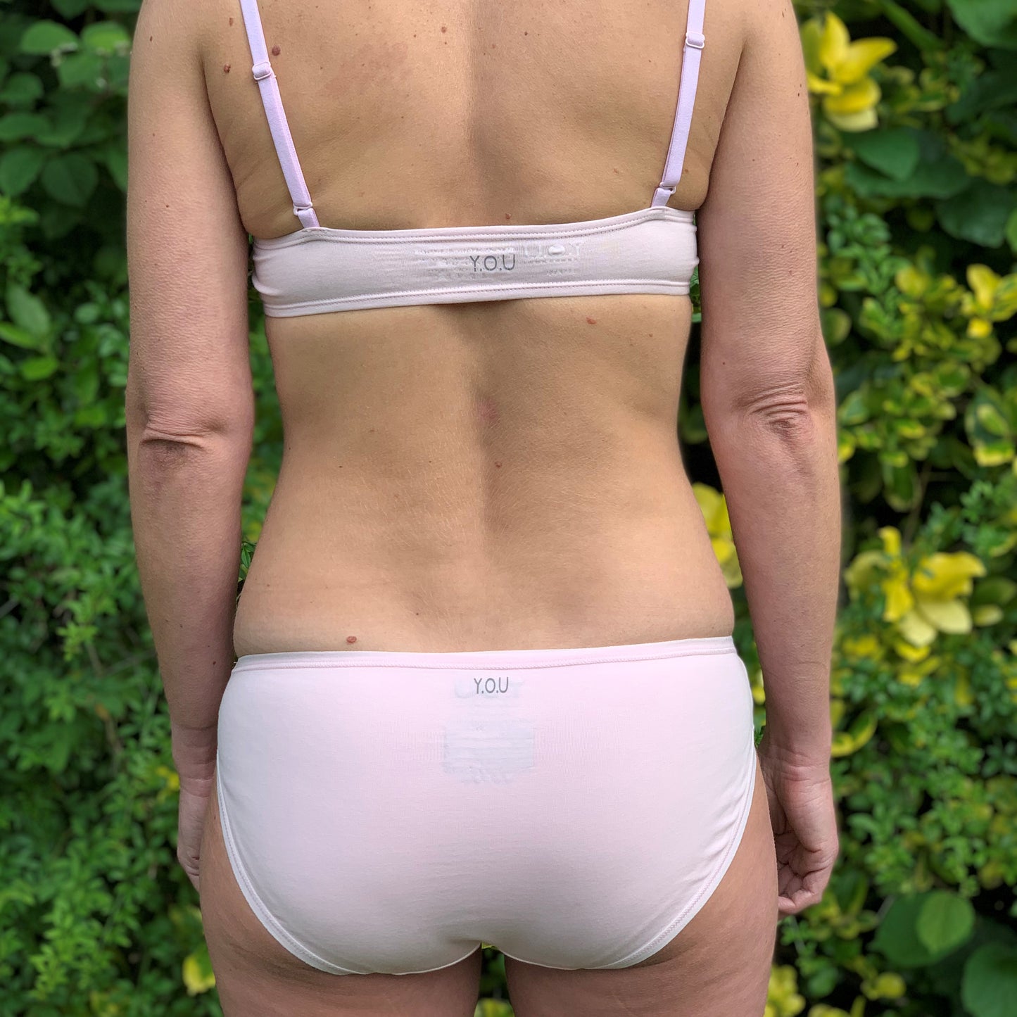Women's organic cotton matching bralette and bikini set in light pink