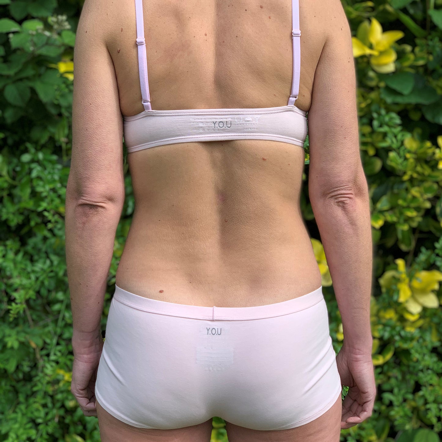 Women's organic cotton matching bralette and boy shorts set in light pink