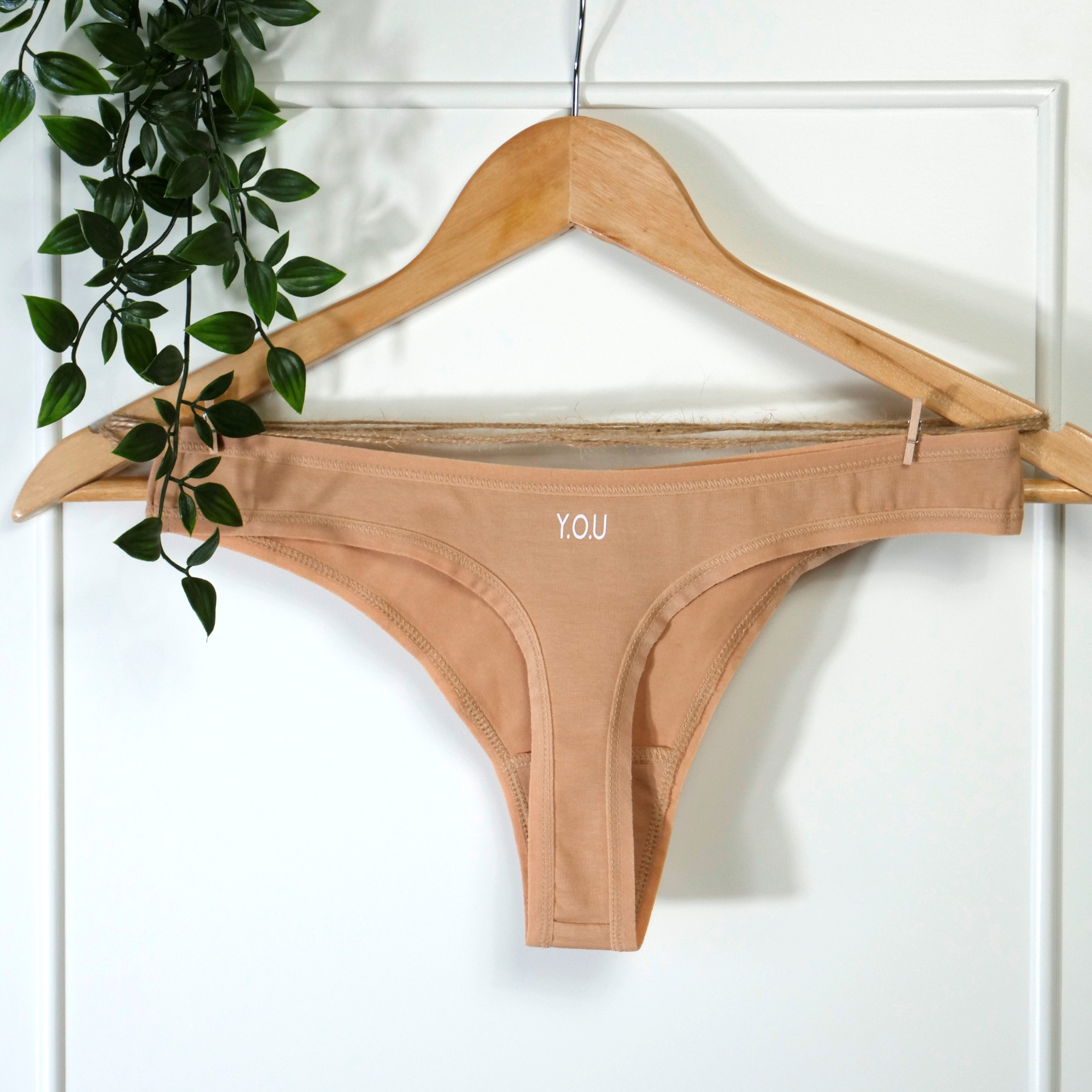 Women's organic cotton thong in almond (light nude)