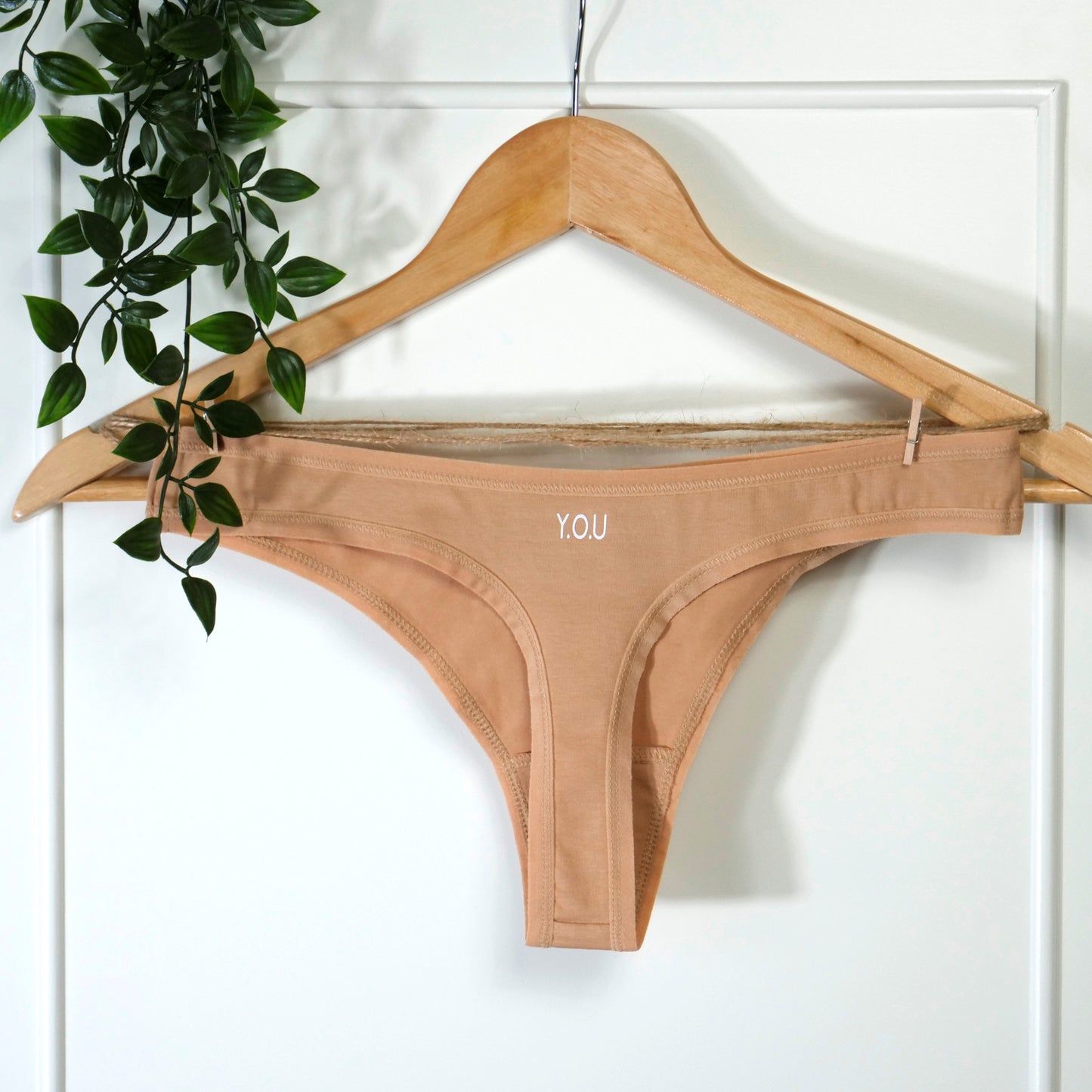 Women's organic cotton thong in almond (light nude)