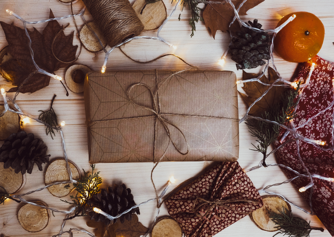 Present wrapped in brown paper with festive decorations