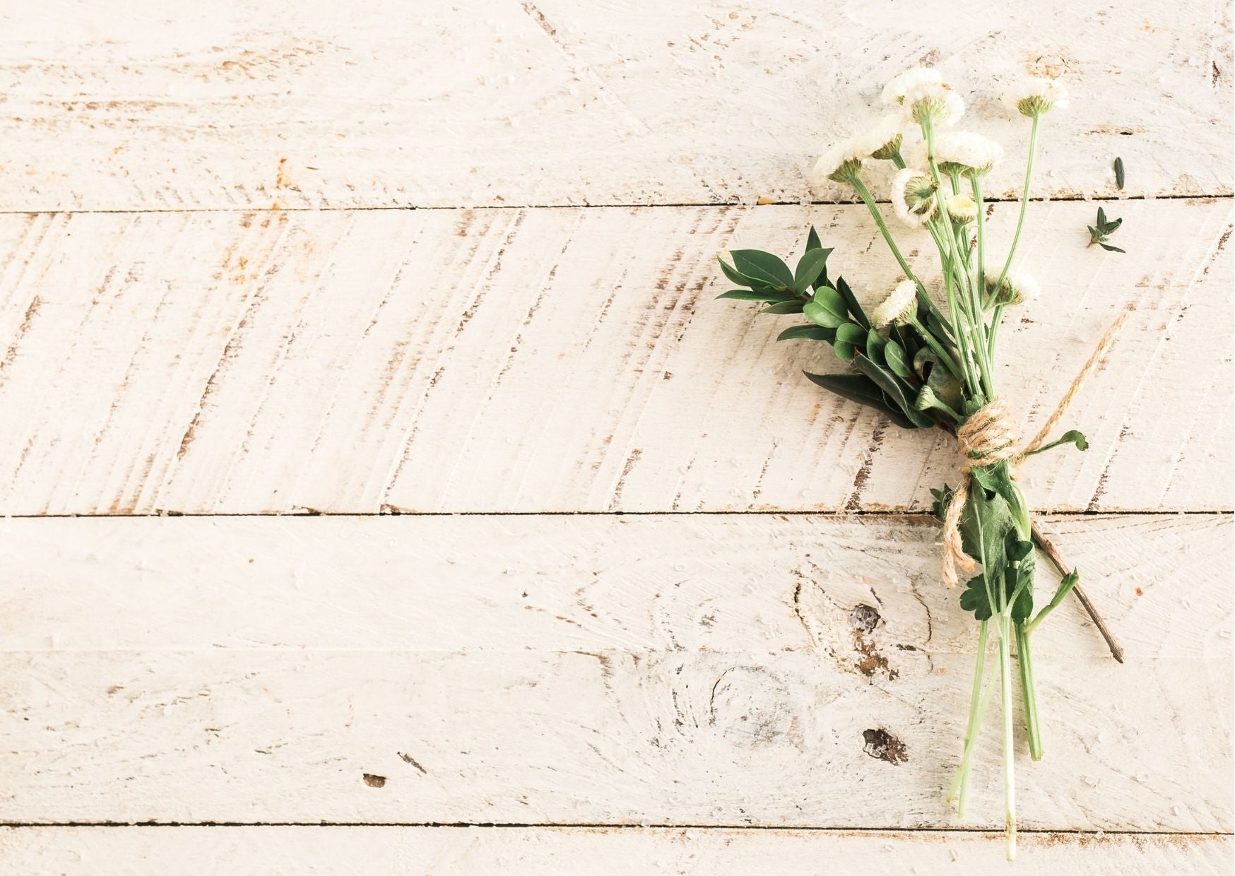 a bunch of flowers on wood