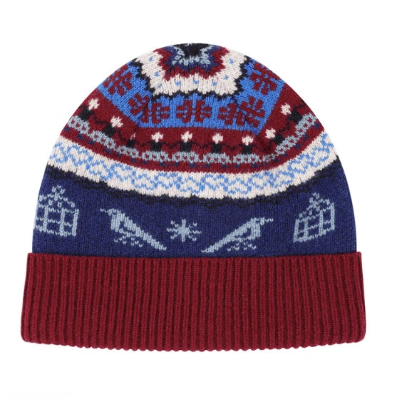 A phot of the Black & Beech fairisle beanie in klein and burgundy on a white background