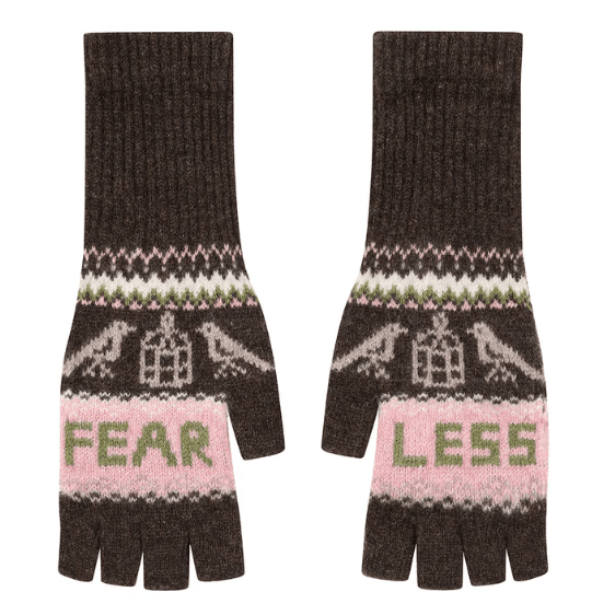 A flat lay photo of the Black & Beech fearless mittens in cocoa and light pink, with sage green writing, on a white background.