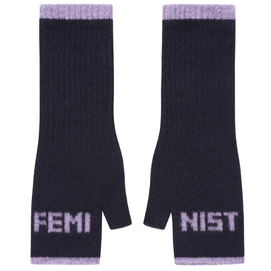 A flat lay photo of the Black & Beech Feminist Gloves in dark blue with lilac writing and cuffs on a white background.