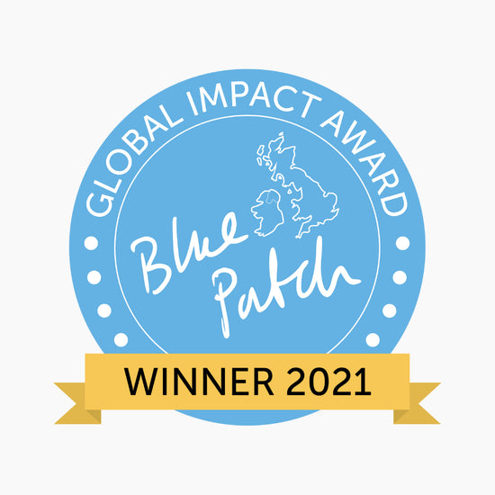 The blue patch global impact award winner 2021 logo