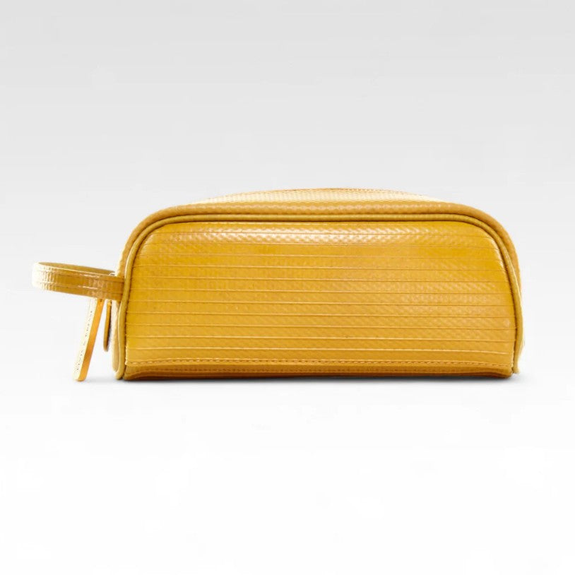 The Elvis and Kresse Yellow Travel Case on a white background