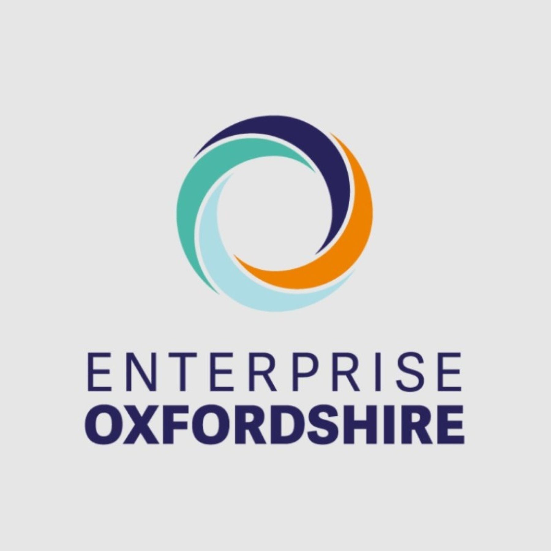 An image which reads 'Enterprise Oxfordshire' at the bottom of the image and has a orange, purple, light blue and teal circle in the top half of the image. 