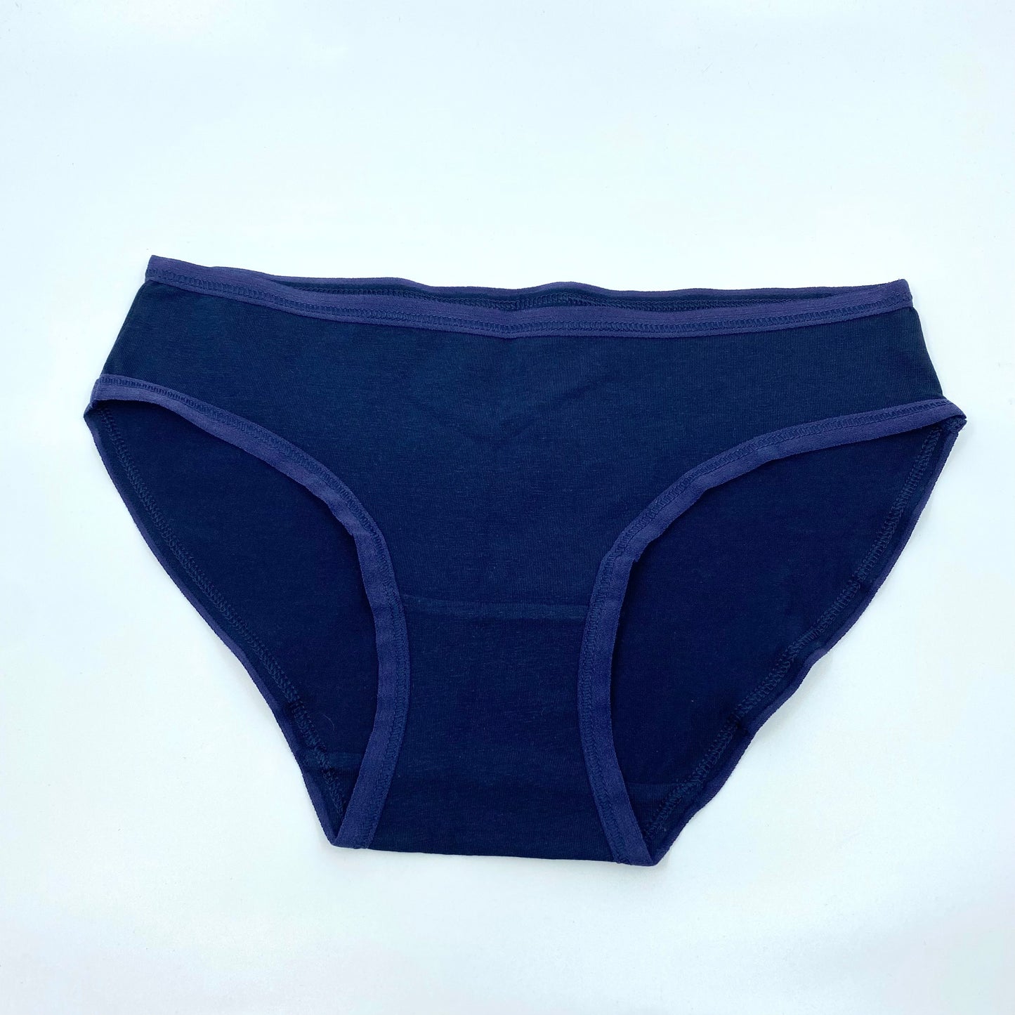 Women’s organic cotton low-rise bikini bottoms in navy blue