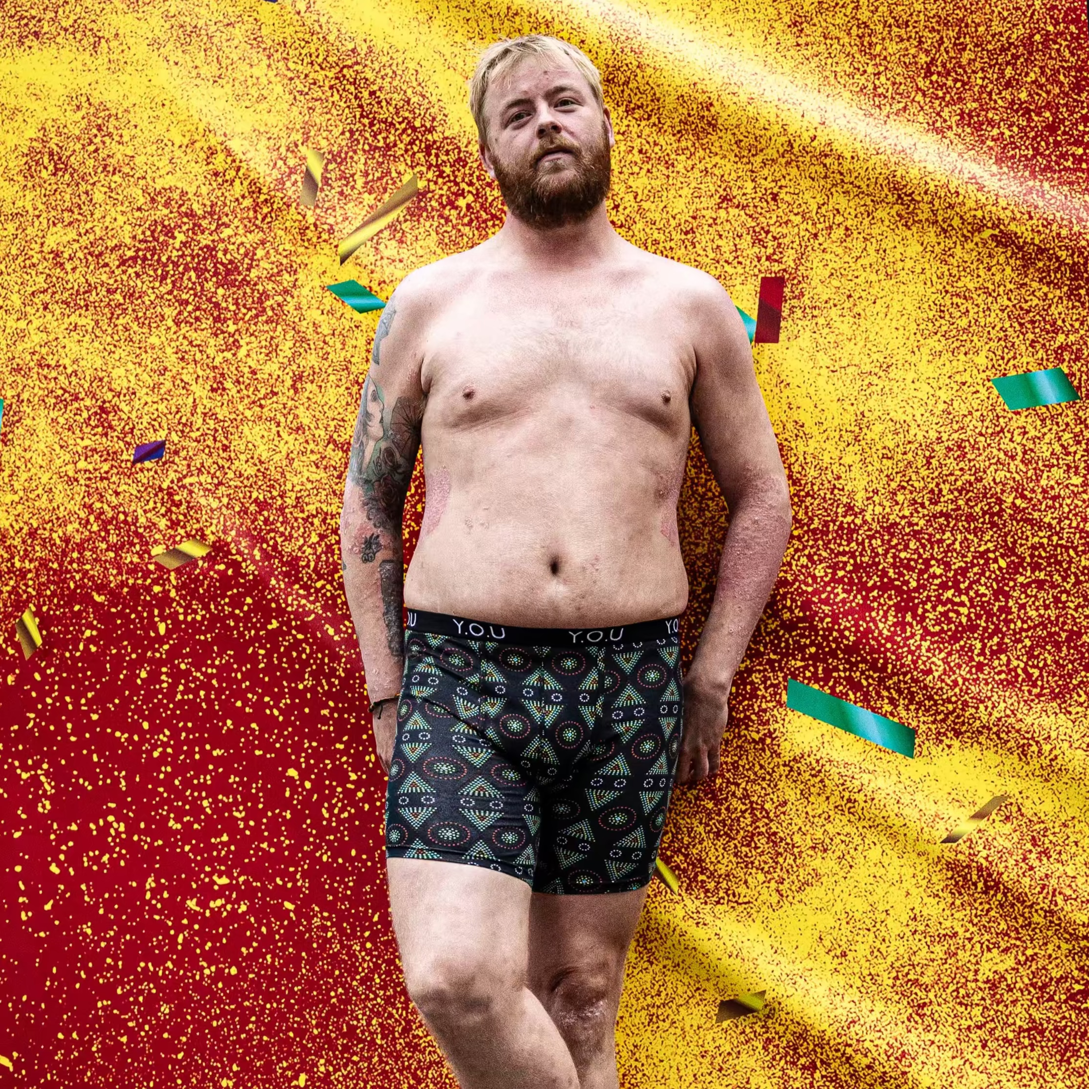 model wearing organic cotton longer leg style trunks in black mara- You Underwear