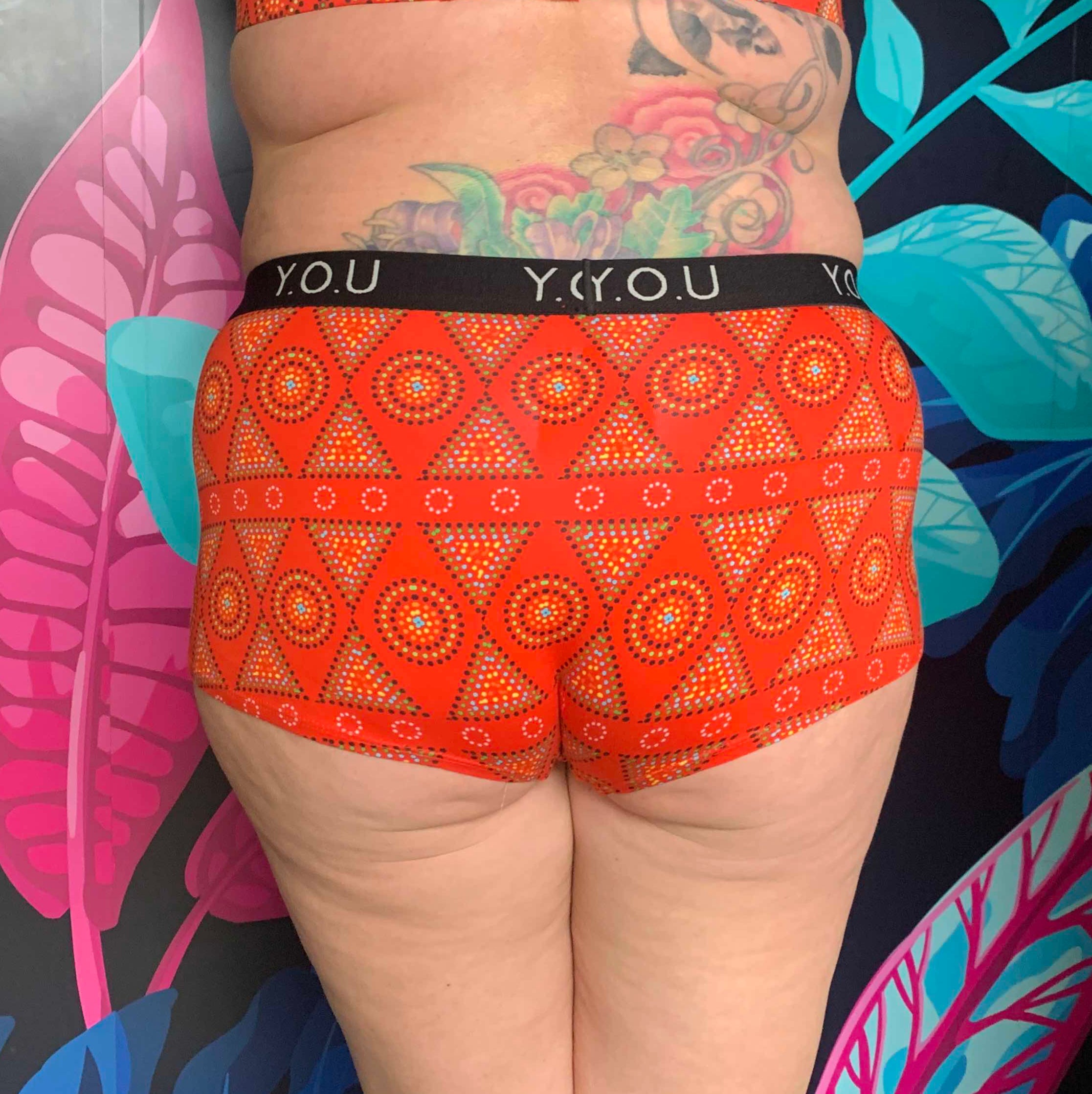 model wearing organic cotton YOU boy shorts red mara print - You Underwear