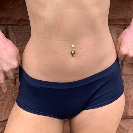 model wearing organic cotton boy shorts in navy blue - You Underwear