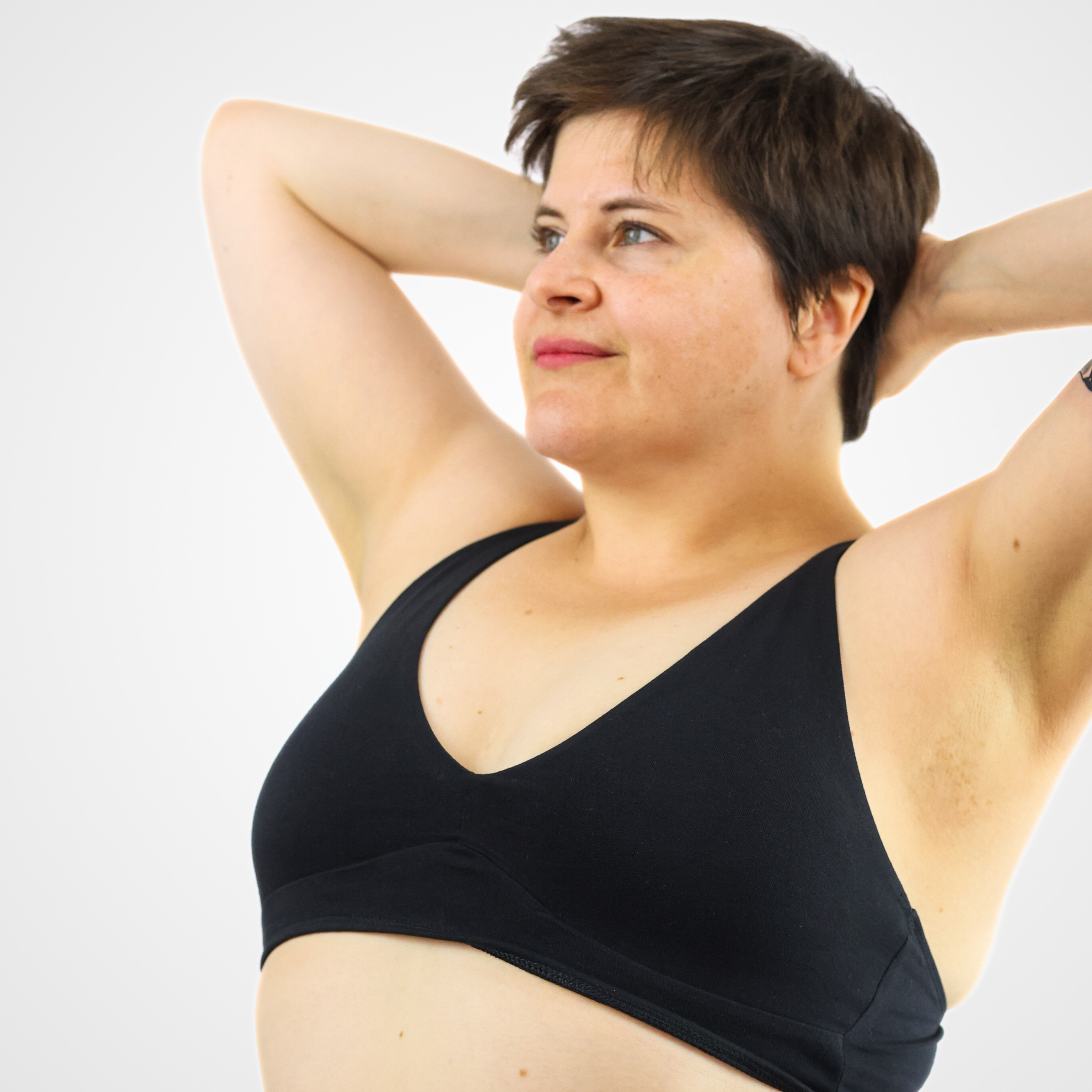 Model wearing an organic cotton black bralette - You Underwear
