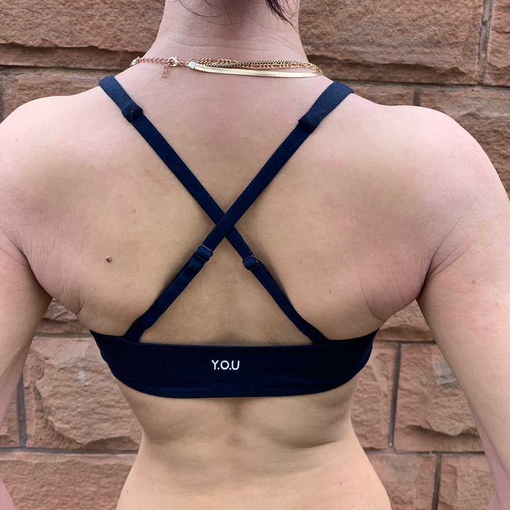 Model wearing an organic cotton navy blue bralette - You Underwear